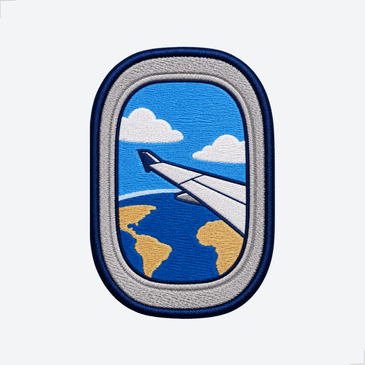 Patch bordado avião e viagem com planeta visto pela janela
